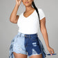 SHEIN SXY Two Tone Fringe Trim Raw Hem Denim Shorts